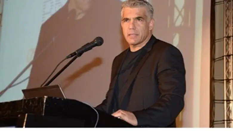 Lapid addresses business owners