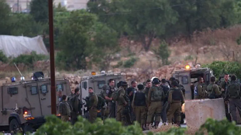 IDF forces outside Halhoul, where the boys' b
