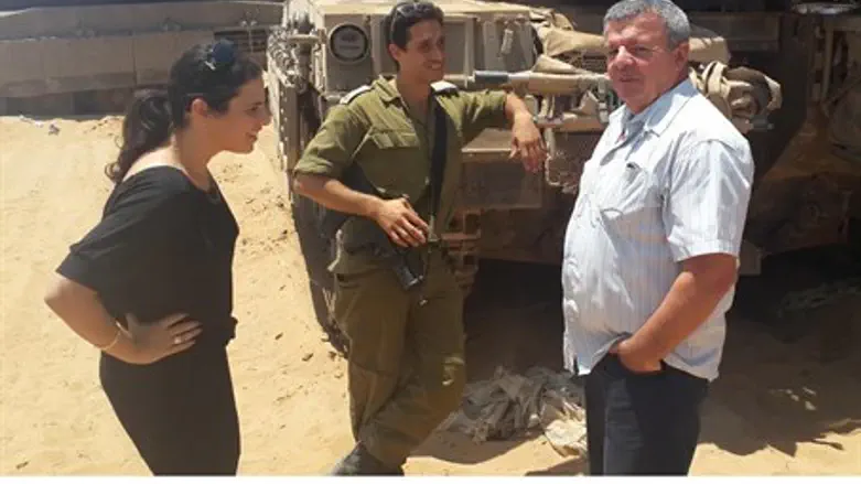 Shaked(L( and Calfa visit an IDF soldier on t