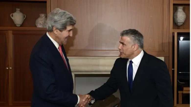 John Kerry and Yair Lapid (file)
