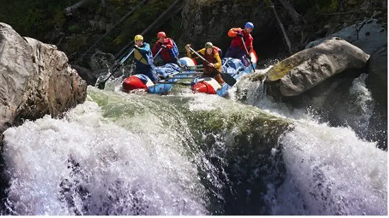 The raft capsized after hitting rapids