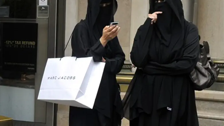 Muslim women in burqa face veils