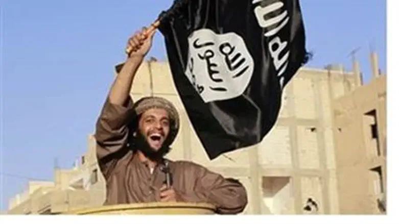 ISIS terrorist with flag (file)