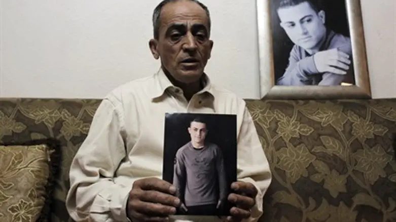 Mohammed Musallam's father with his photos