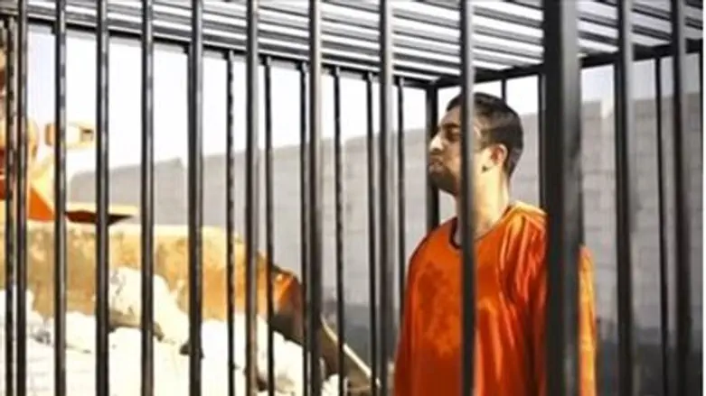 Моаз аль-Касаcби перед казнью