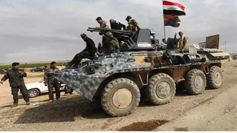 Iraqi army and Shia militia forces in Al-Alam, north of Tikrit