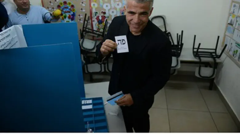 Yair Lapid voting