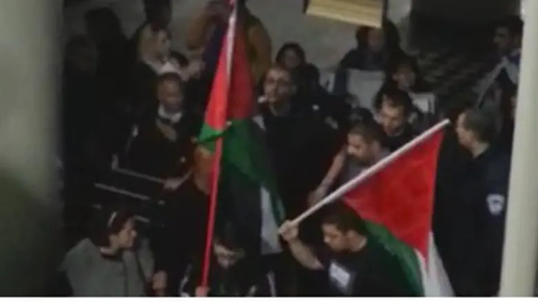 PLO flags in Haifa protest supporting play