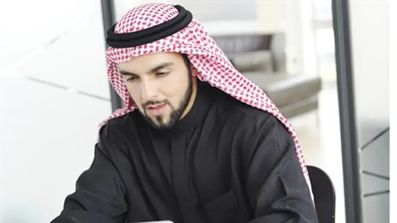 Arab man using a computer (illustration)