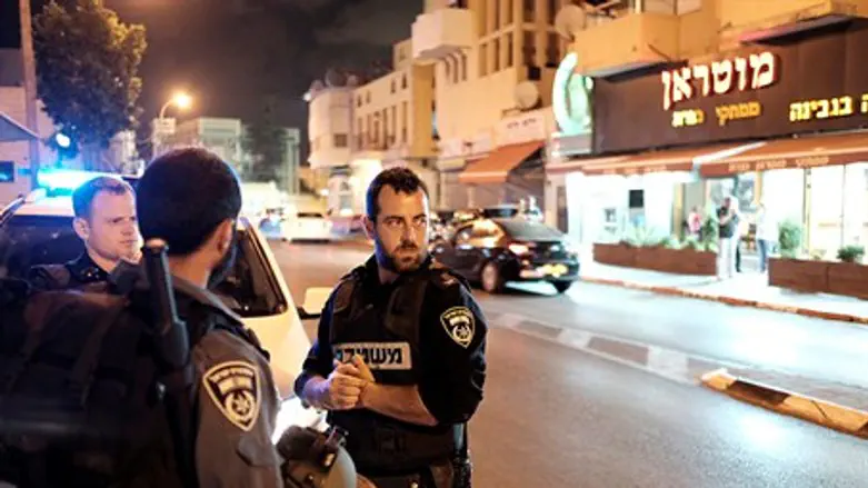 Israeli police officers guard in the streets of Jaffa