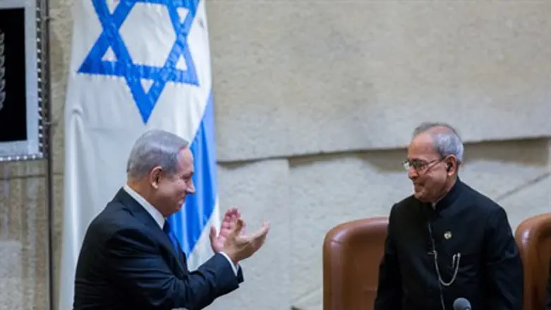Netanyahu greets Indian president Pranab Mukherjee during a special session at the Knesset