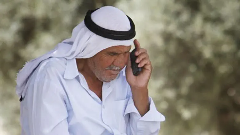 Arab man on cellphone