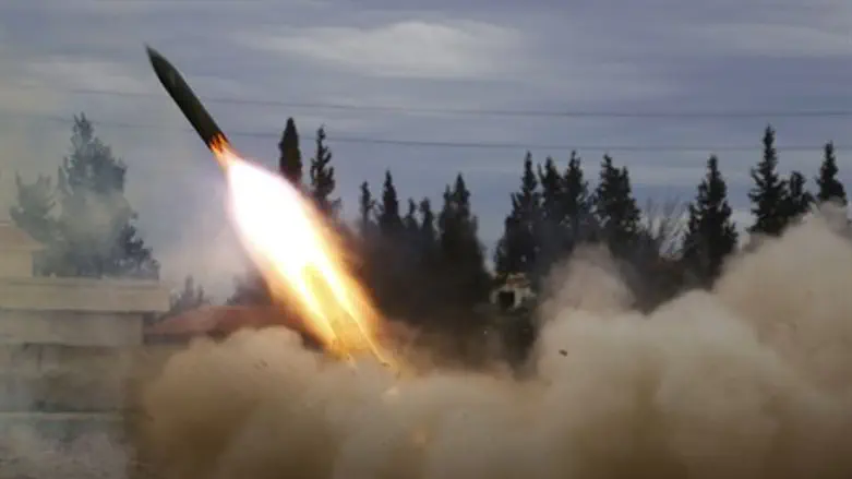 Jaish Al-Islam fighters launch a rocket (file)