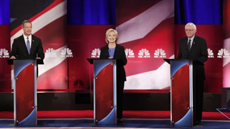 Presidential candidates (L-R) Martin O'Malley, Hillary Clinton and Bernie Sanders at Democ