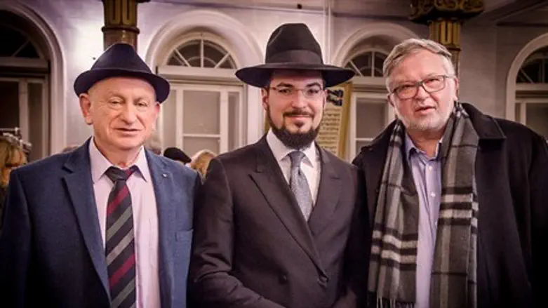 Rabbi Isaacson and two community members at the Main Shul in Vilna