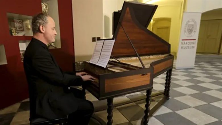 Musician Lukas Vendl plays a recently discovered music manuscript composed by Wolfgang Ama