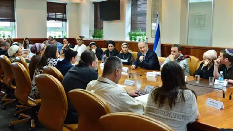 Binyamin Netanyahu with representatives of the families