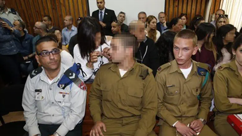 Soldier charged over shooting Hevron terrorist appears in court