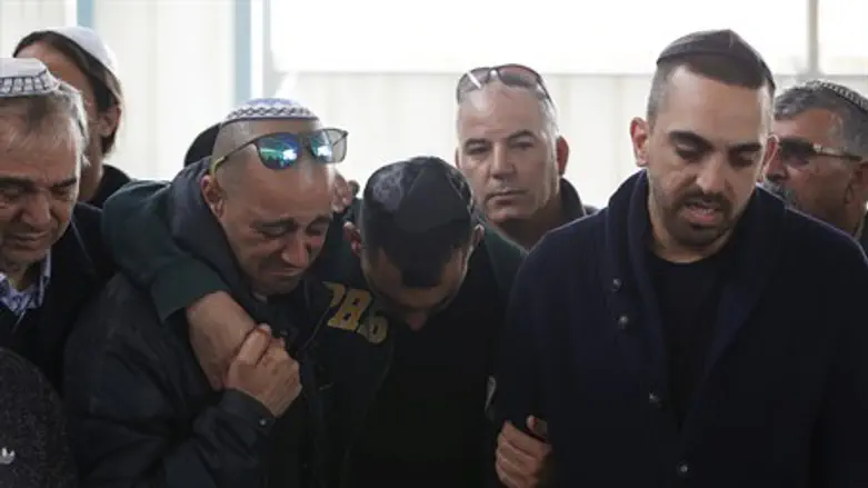 Friends and relatives cry at funeral for Istanbul attack victim Simcha Damari in Dimona, I