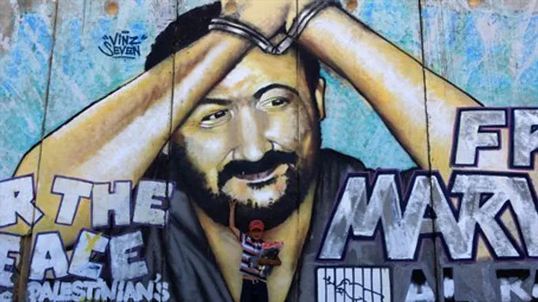 Marwan Barghouti mural on security barrier