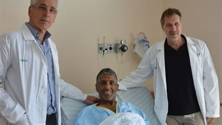 Medical team with the implant recipient 