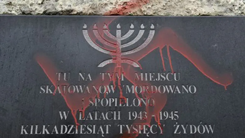 Vandalized Polish Holocaust memorial (file)