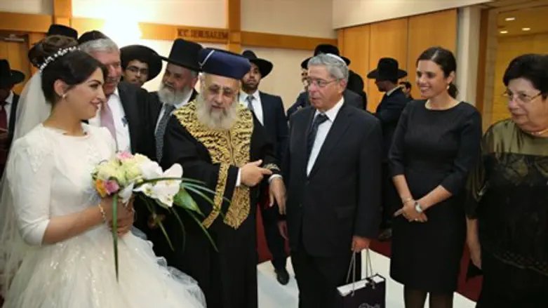 Rabbi Yitzhak Yosef with his daughter