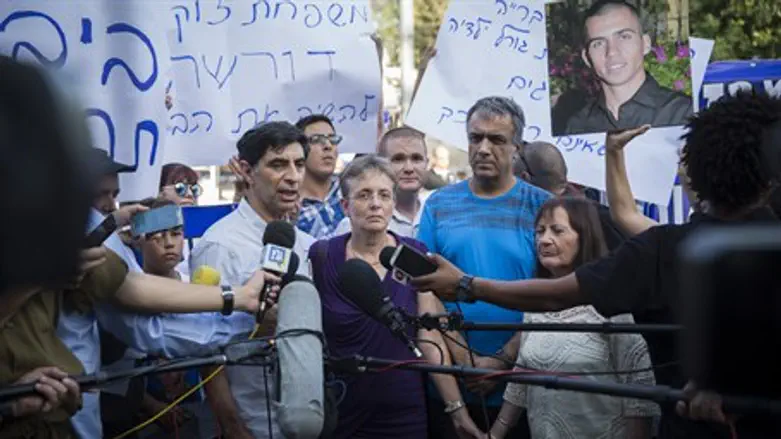 Goldin and Shaul families at the protest tent
