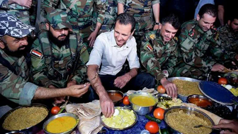 Bashar al-Assad breaks Ramadan fast with Syrian regime troops