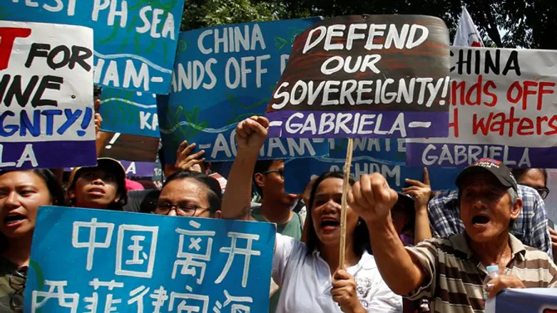 Protesters in the Phillipines, against China's use of force in the South China Sea
