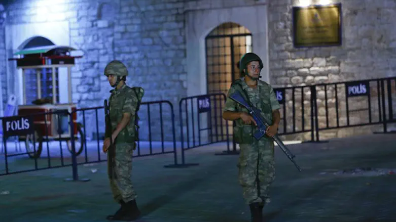Turkish military stand guard near the Taksim Square in Istanbul