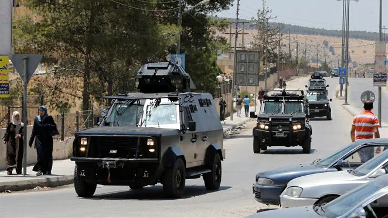 Security vehicles near Baqaa