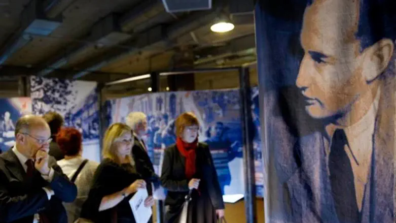  Visitors watch a photo exhibition of Raoul Wallenberg
