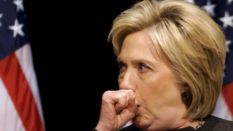 Hillary Clinton coughs