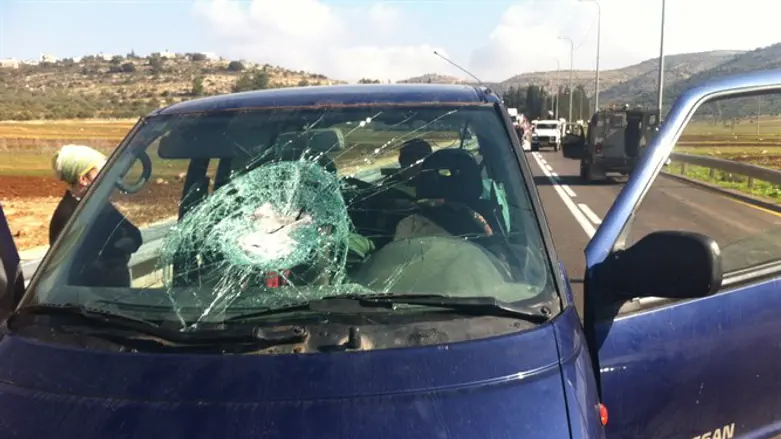 Car after rock attack (illustrative)