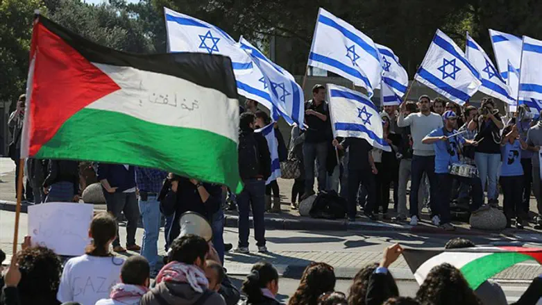 People wave Israeli and PA flags (illustrative)