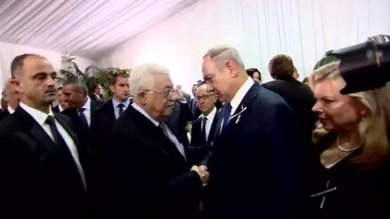 Netanyahu and Abbas at funeral