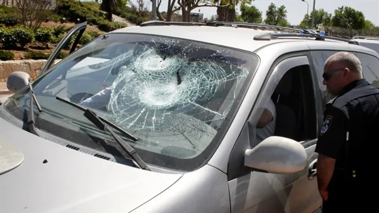Car windshield smashed in rock attack
