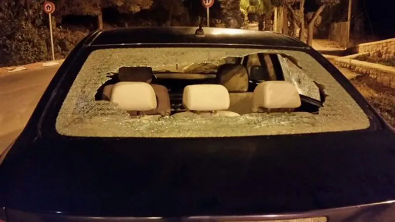 Car damaged by stones 