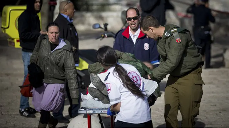 wounded soldier evacuated from scene of terror attack