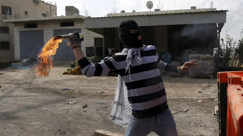 Arab throwing a firebomb (illustrative)