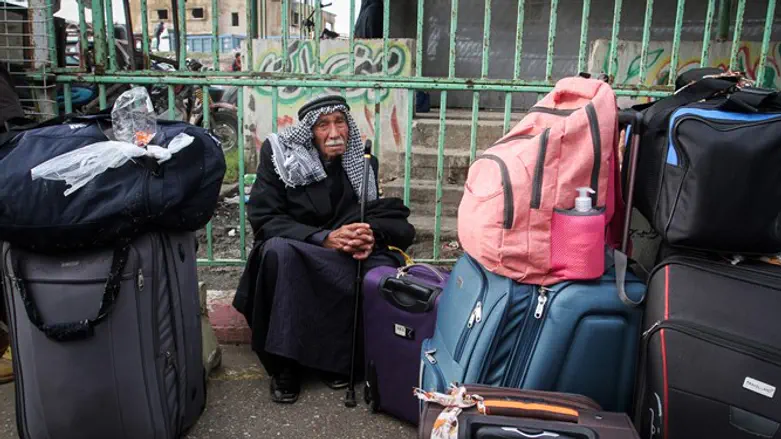 Gazans wait to cross into Egypt through Rafah border crossing