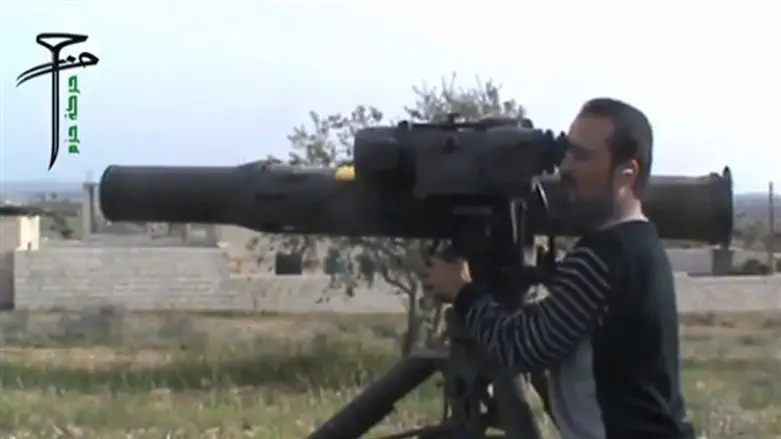 Syrian rebel aims US-made BGM-71 TOW anti-tank rocket 