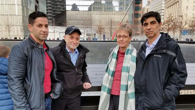 Jeffrey and Harvey Morgenstern with Leah and Simcha Goldin at the 9/11 Memorial in lower M