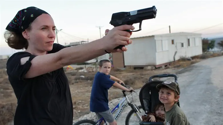 Jewish woman practices shooting (illustrative)