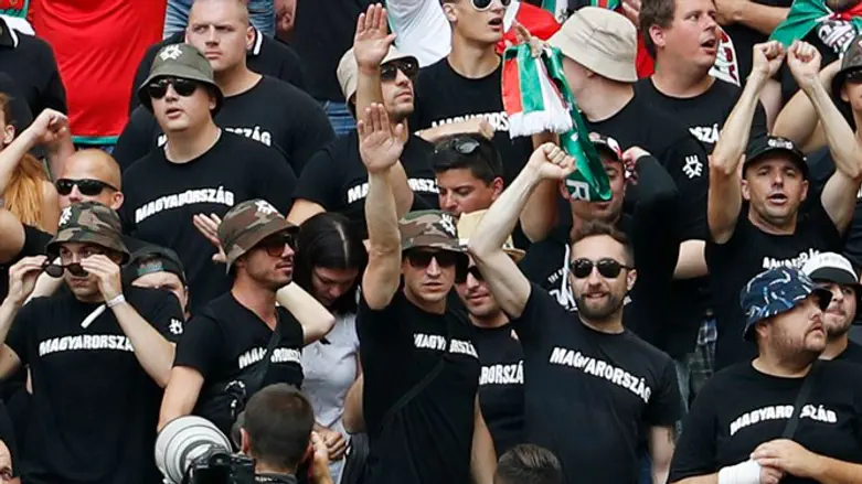 Hungarian far-right ultras perform Nazi salutes during EURO 2016