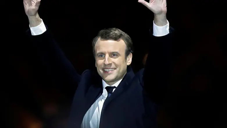 Emmanuel Macron celebrates