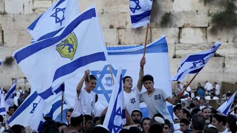 Dancing with Israeli flags in Jerusalem