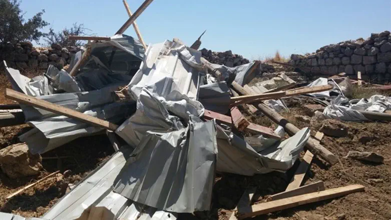 Destroyed structure in Amona