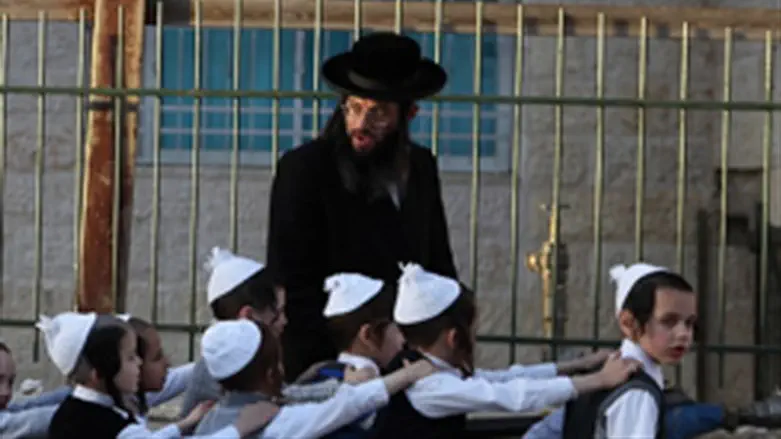 Toldot Aharon teacher with children